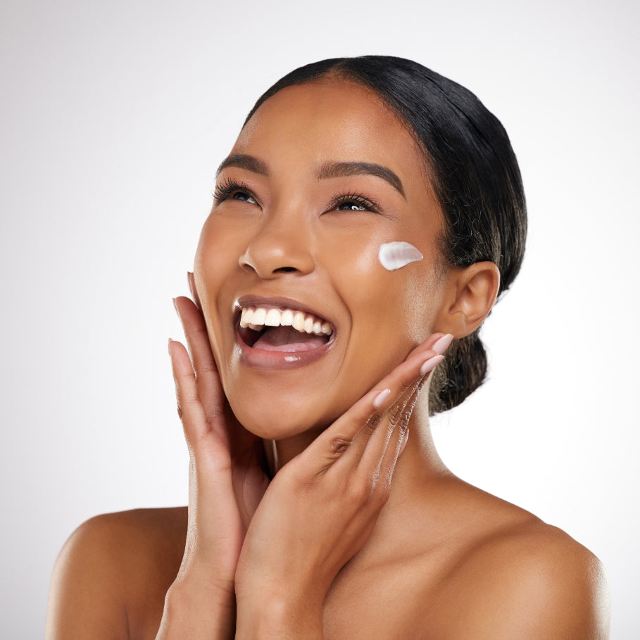Girl applying Ascorbic Acid Serum on face